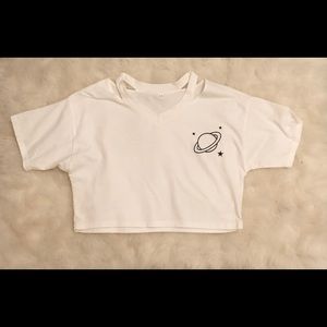 Cropped white top with Saturn print.